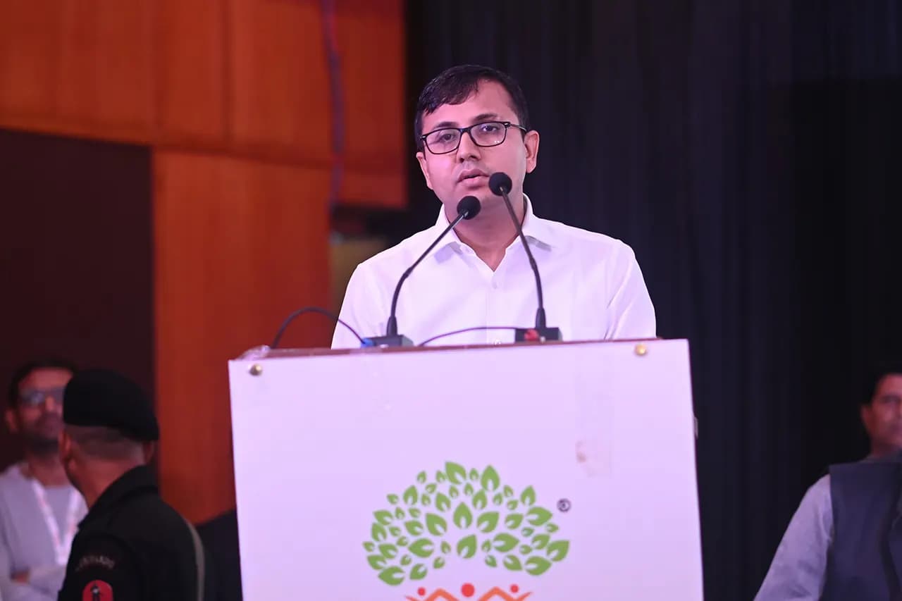 Brajesha Sharma addressing a Gram Sansad gathering from the podium